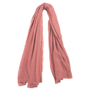 Large blush pink cashmere stole, plain fabric draped with soft, airy texture