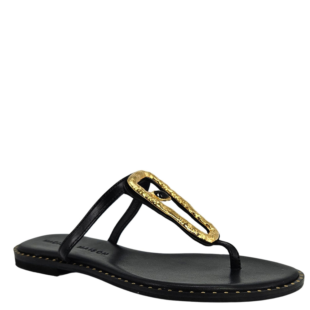 Black leather flat thong sandal with hammered gold link ornament and stitched sole edge