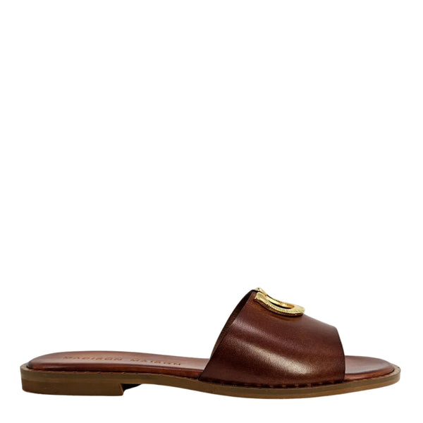 Caramel leather flat slide sandal with horseshoe buckle at the upper