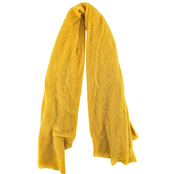 Yellow cashmere stole draped lengthwise with straight hanging ends