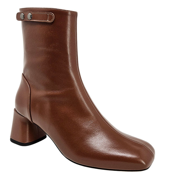 Brown leather ankle boot with top strap and metal eyelets, chunky block heel.