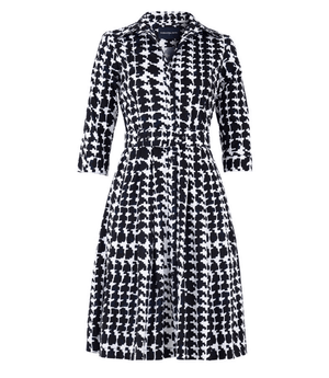 Black-and-white patterned long-sleeve dress with V neck collar and defined waist