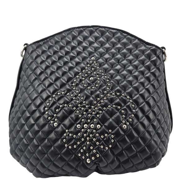 Quilted navy leather shoulder bag with studded fleur-de-lis emblem and metal rings