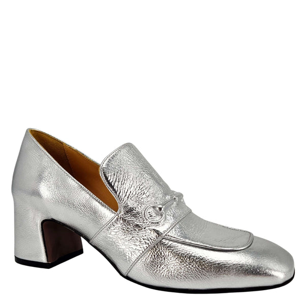 Silver leather loafer with mid block heel, metal bit detail and moc-toe seam