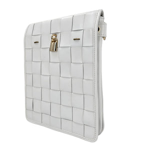 White woven leather crossbody bag with woven texture and gold lock on front flap