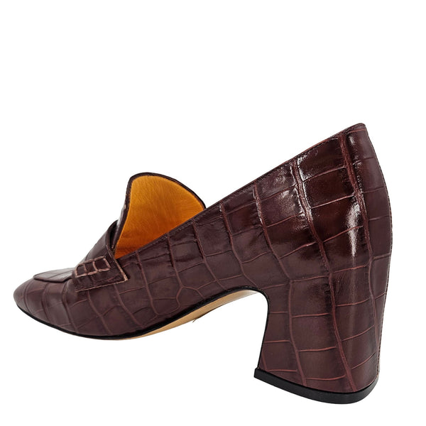 Chocolate croc-embossed leather loafer with moc vamp and block heel, angled view from toe