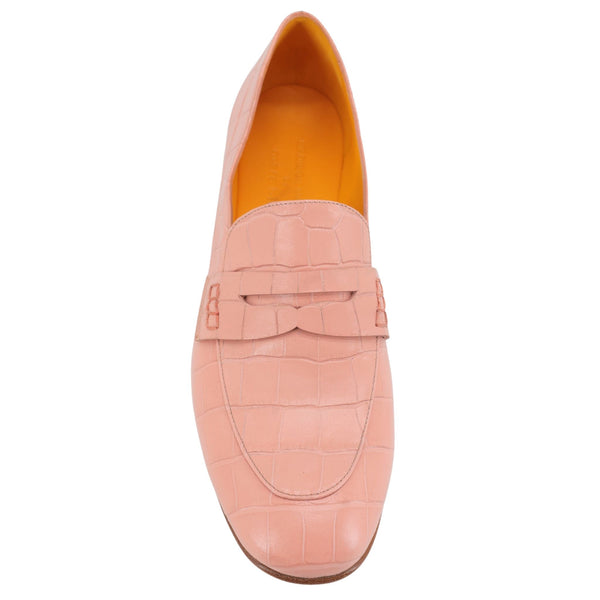 Nude pink croc-embossed leather loafer front, moc toe and penny strap, brown sole edge