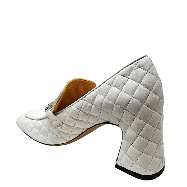 White quilted leather loafer, side view with angular block heel and buckle