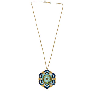 Gold-tone beaded pendant necklace with small blue mandala flower drop