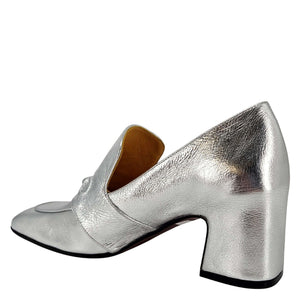 Silver leather loafer with sculpted mid heel and metal bit detail at vamp