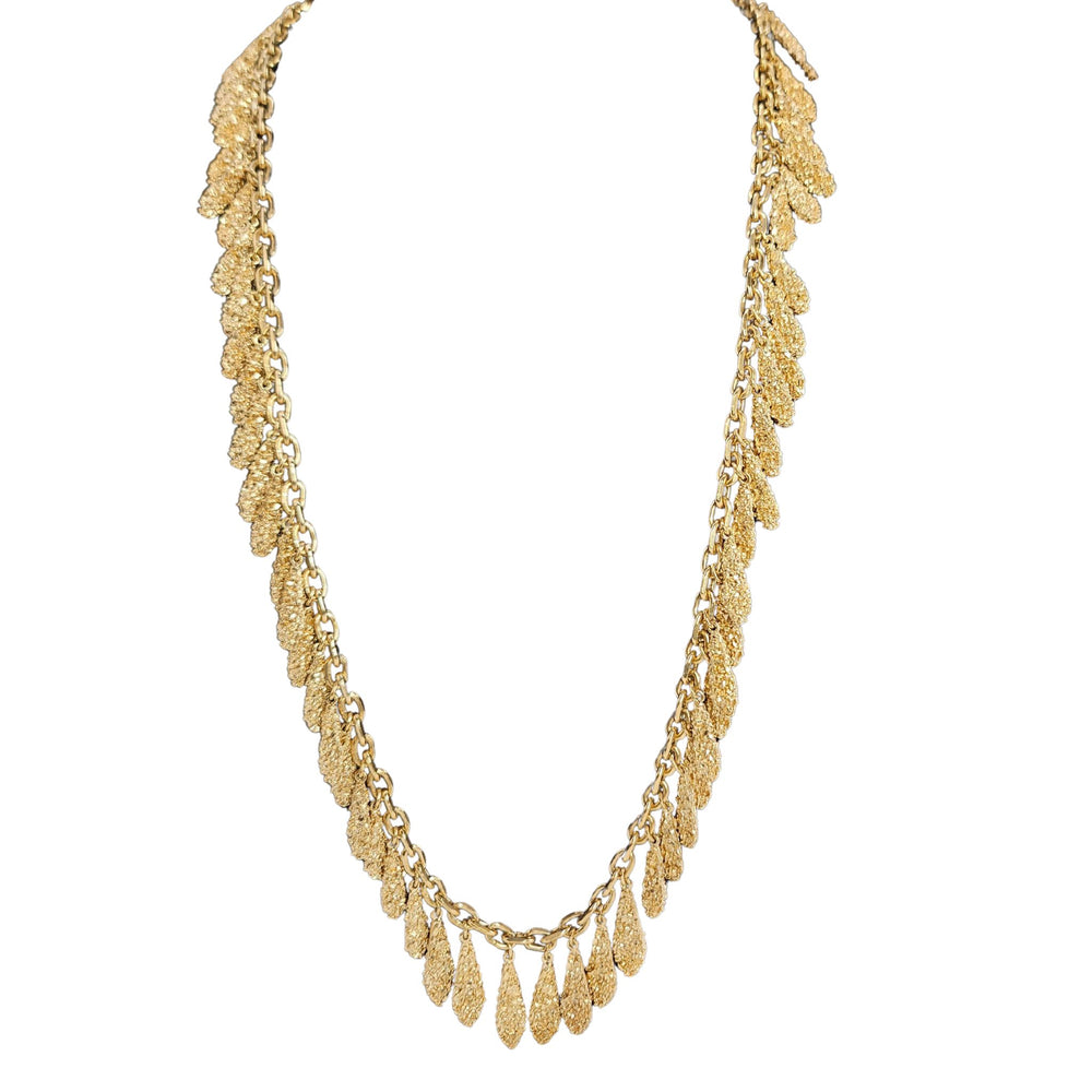 Gold-tone textured station necklace with fringe tassel drop links