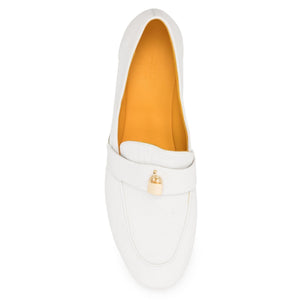 White leather flat loafer, interior side view with gold lock emblem near heel