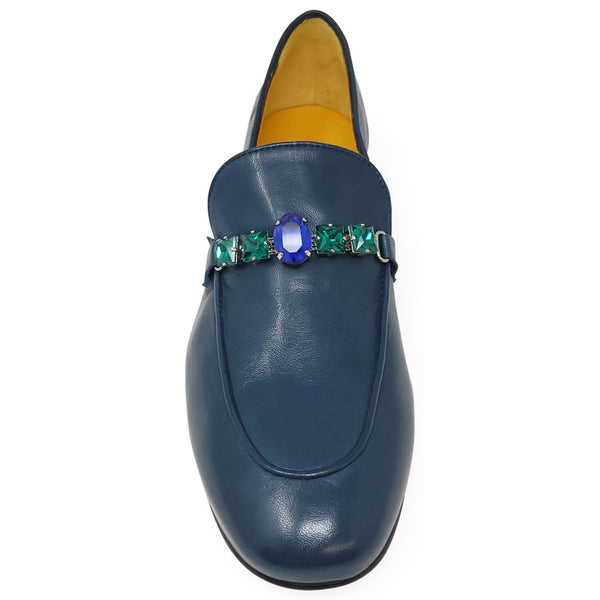 Blue leather flat loafer front view with colorful jeweled buckle at vamp