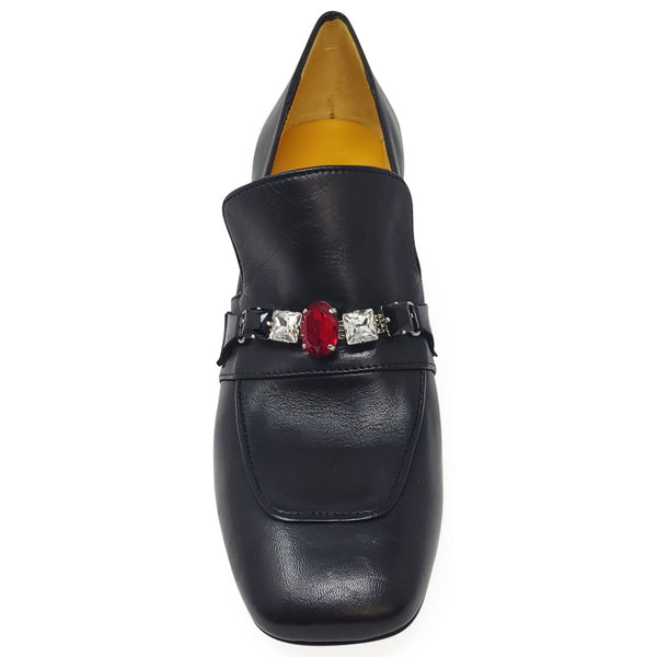 Black leather slip-on loafer with jeweled front strap and red-and-clear stones