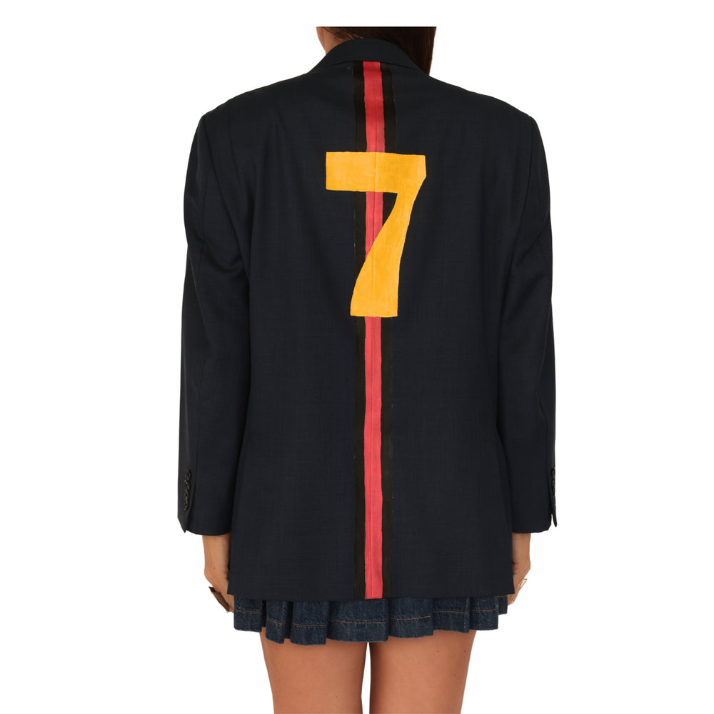 Navy racing stripe blazer, back view with red vertical stripe and large yellow 7.
