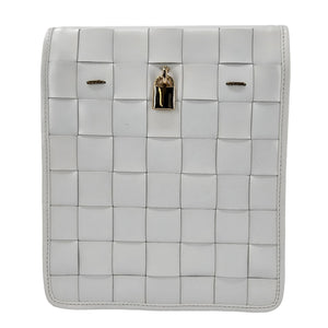 White woven leather crossbody bag front flap with woven grid pattern and gold lock clasp