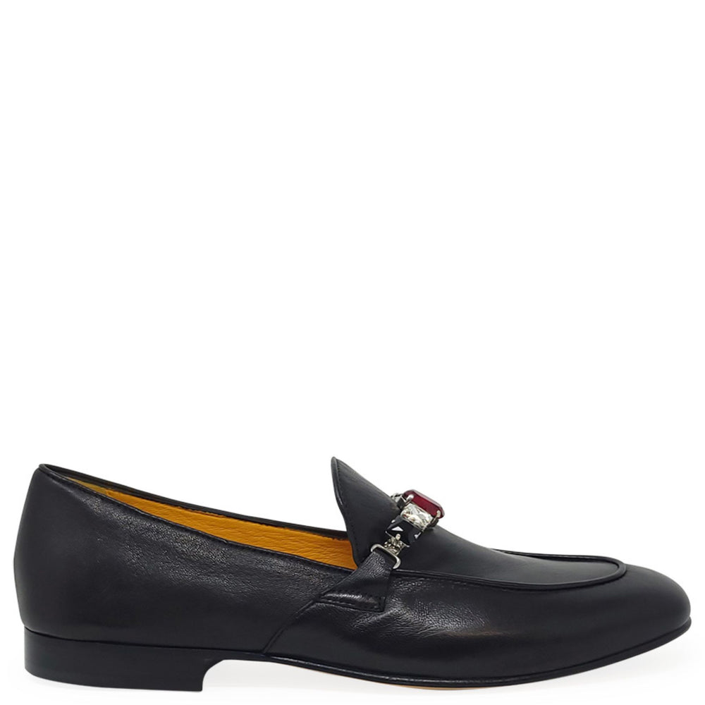 Black leather loafer with jeweled ornament and low flat sole
