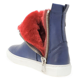 Navy leather ankle boot with red shearling interior and zipper pull
