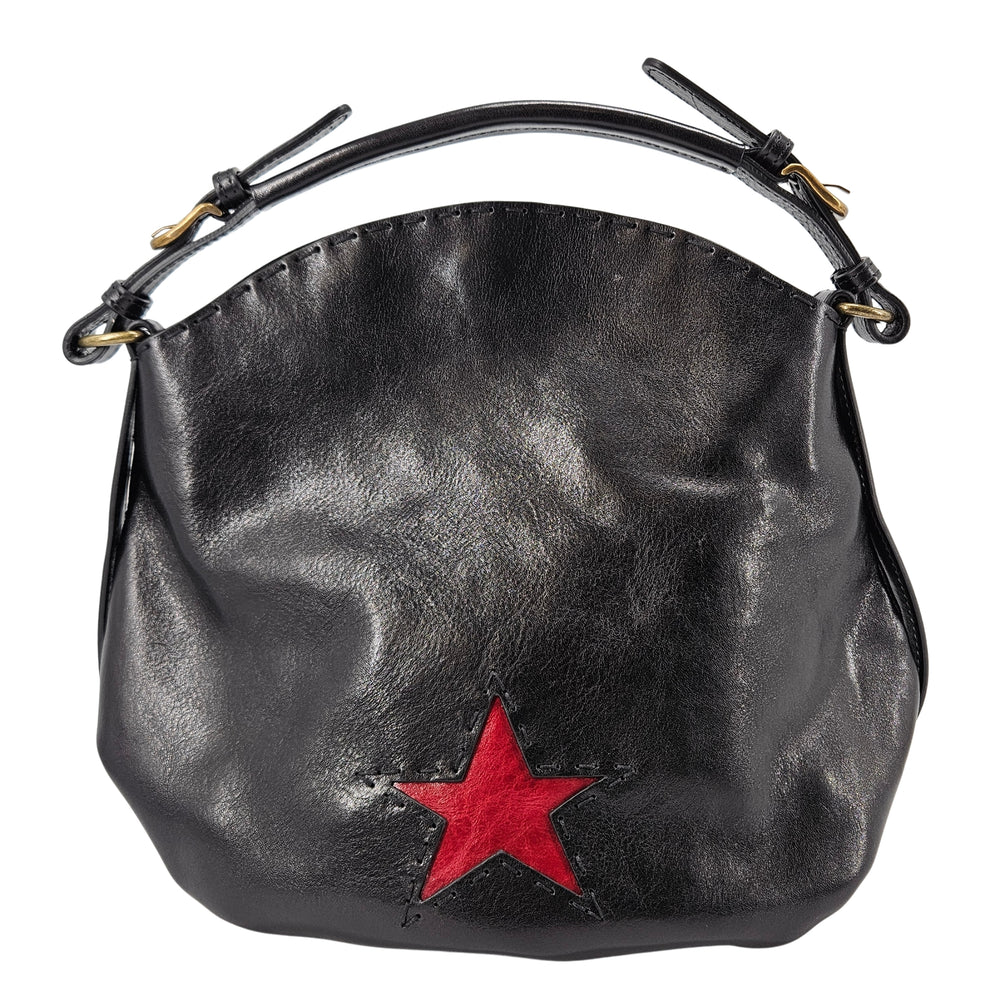 Black leather shoulder bag with a red star accent and adjustable strap