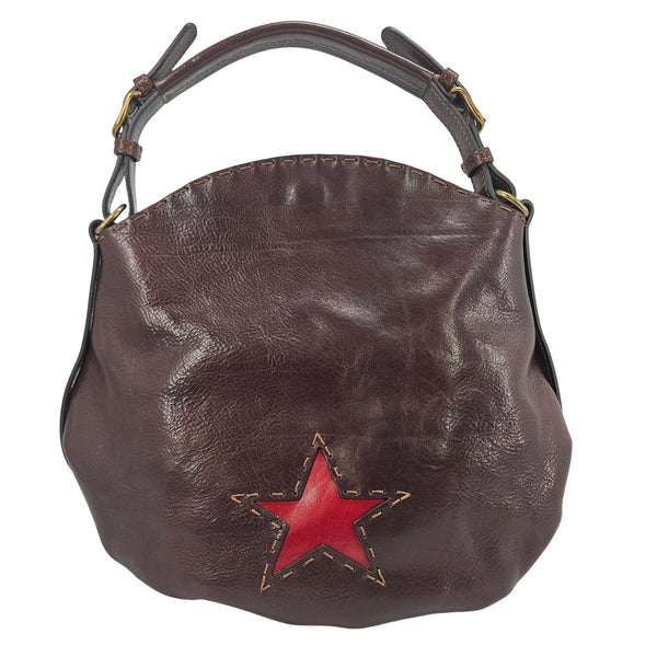 Brown leather star shoulder bag with red star applique and metal ring hardware