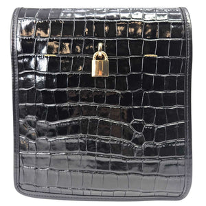Black croc-embossed leather crossbody bag back with gold lock and stitched paneling