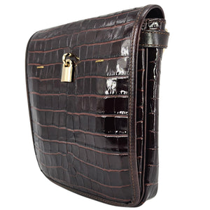 Chocolate croc-embossed leather crossbody bag, side view with adjustable strap