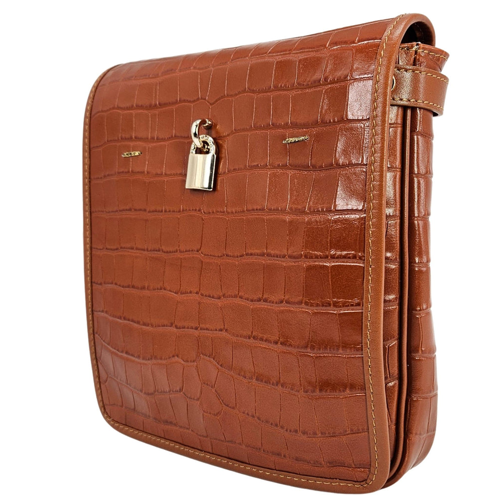 Tan croc-embossed leather crossbody bag with top flap and silver clasp lock