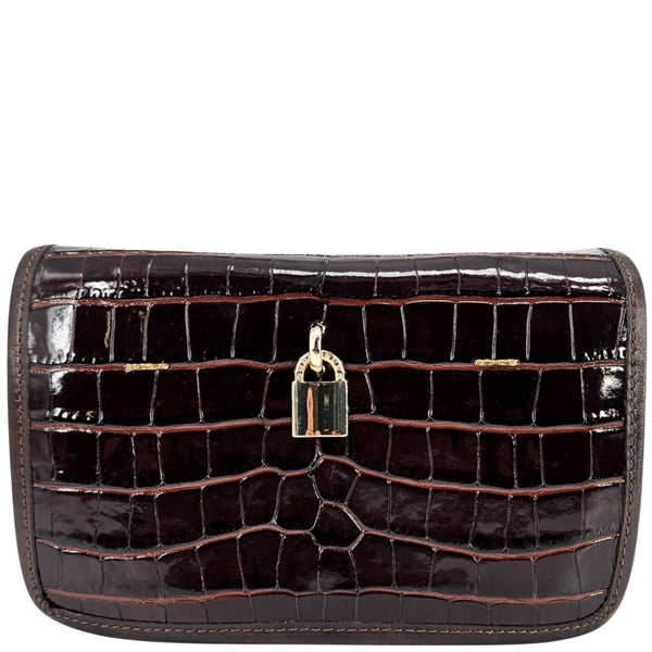 Small dark-brown croc-embossed leather crossbody bag, front view with gold padlock clasp