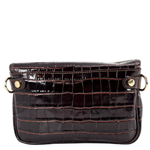 Small dark-brown croc crossbody bag with top flap, snap buttons, and gold hardware