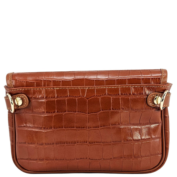 Tan croc-embossed leather small crossbody bag, back view with adjustable straps