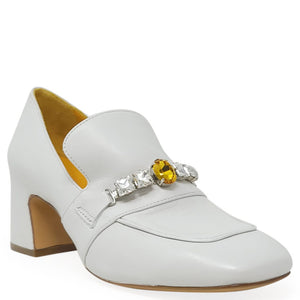 White leather loafer with jeweled front bar featuring yellow center stone