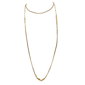 Gold-tone long station link chain necklace with curved drape and hook clasp