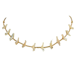 White shell bird charm necklace, evenly spaced bird pieces on gold-tone chain