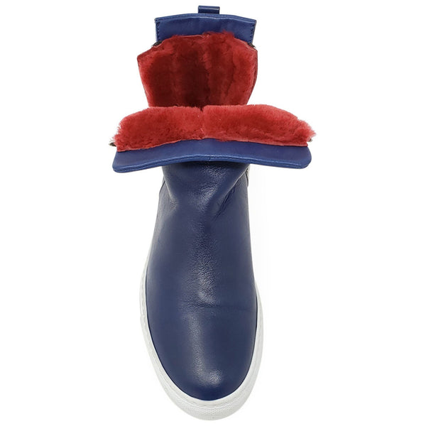 Navy leather boot with red shearling collar and white contrast sole, rear view