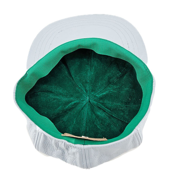 White denim motorcycle hat interior with green lining and stitched brim edge