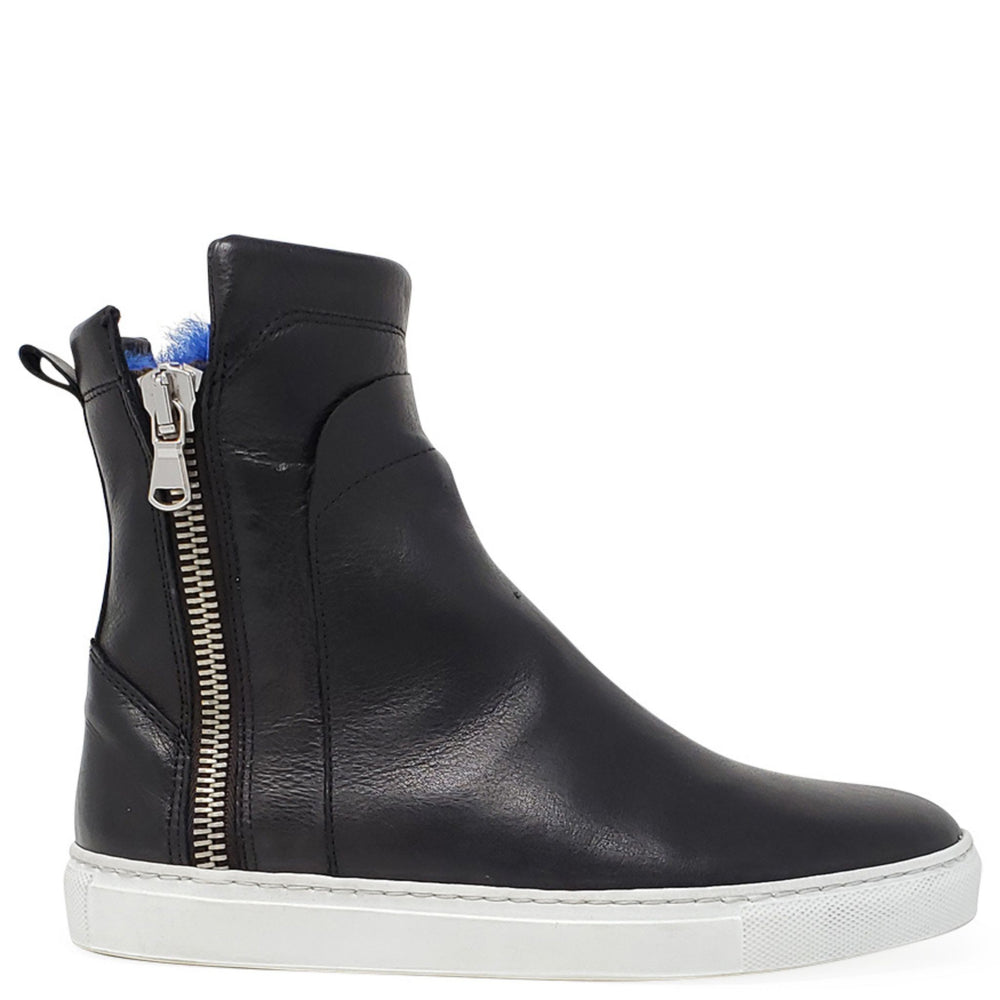 Black leather ankle boot with side zipper, white outsole, and blue shearling lining