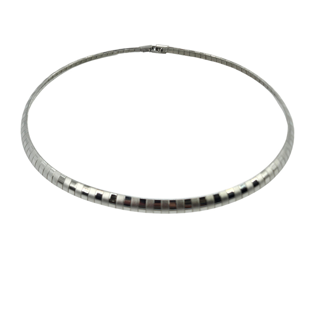 Silver collar necklace with alternating ribbed bead segments and square clasp