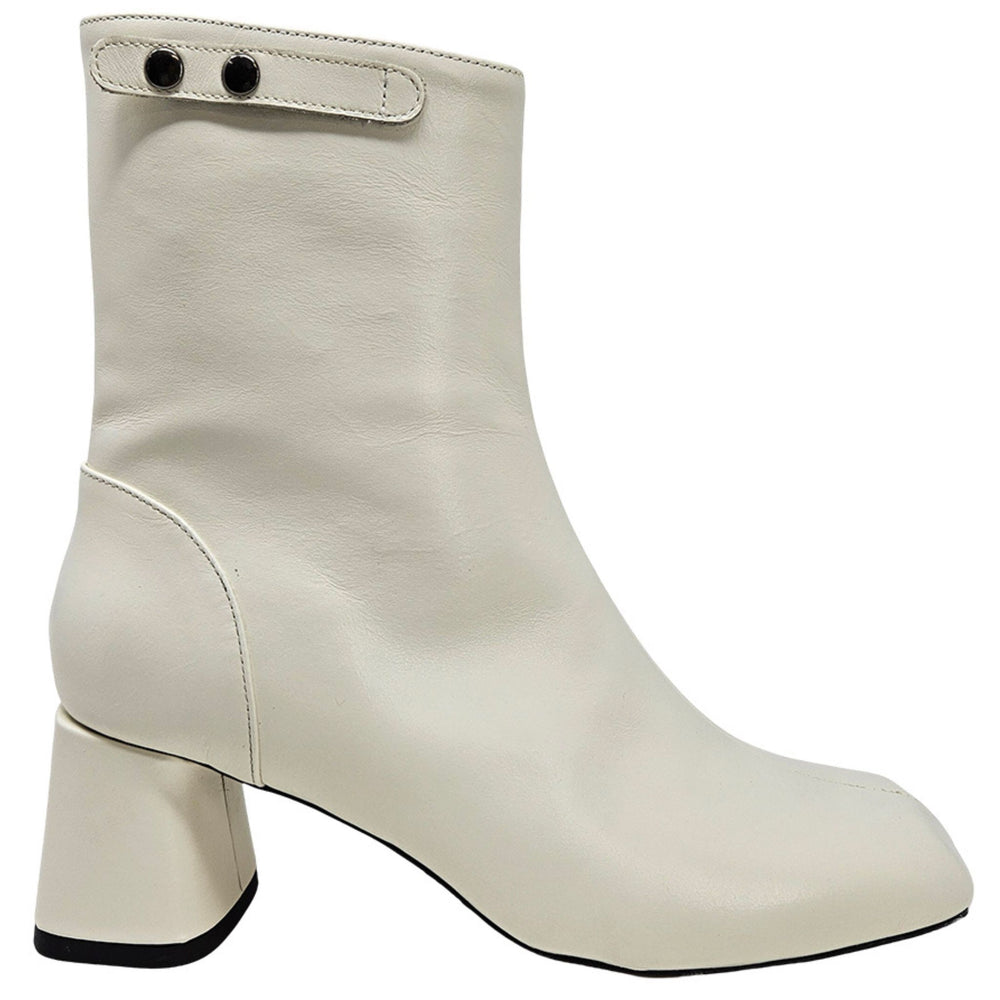 Off-white ankle boot with chunky block heel, side elastic panels, pull tabs