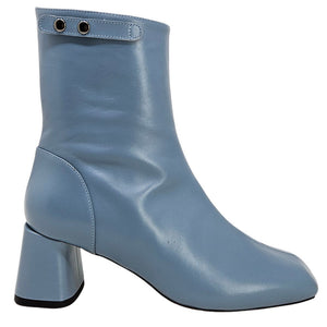 Light blue ankle boot with block heel, side eyelets and pull tab.
