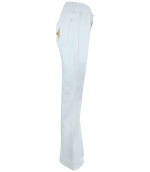 White denim flare jeans with gold star patch near thigh and back patch pockets