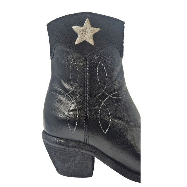 Black leather ankle boots with pointed toe, star applique, low block heel