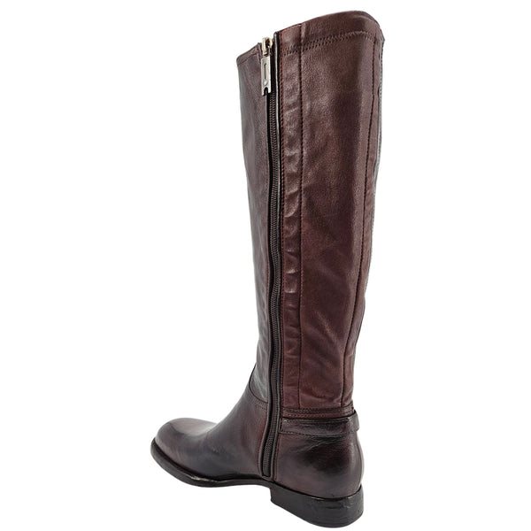 Brown leather knee-high boot with full side zipper and low block heel.