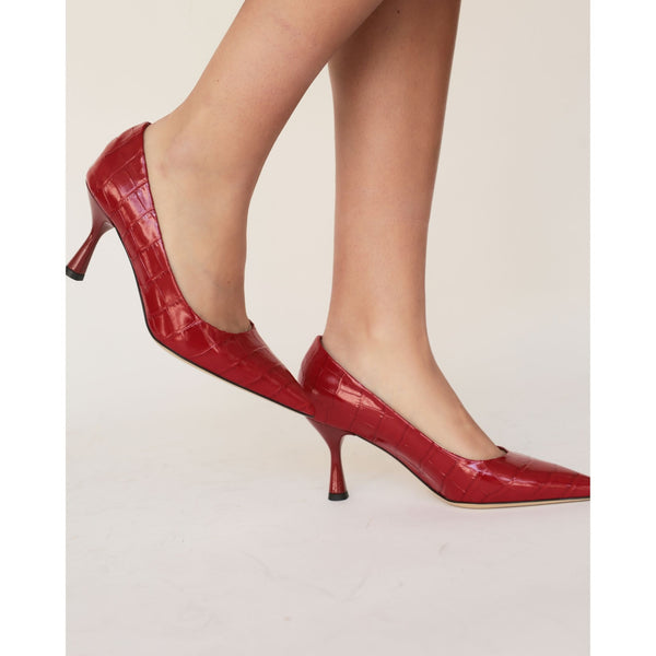 Red croc-embossed leather pointed-toe hi-heel pump on model