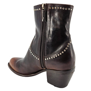 Western ankle boot in dark leather with front zipper and studded curved trim, block heel