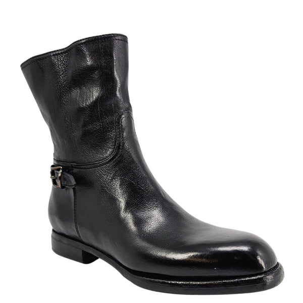 Mid-calf leather boot with side buckle and dark leather upper, low heel