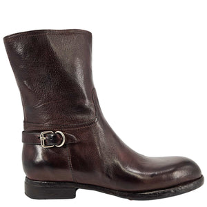 Brown leather mid-calf boot with side buckle strap and low block heel