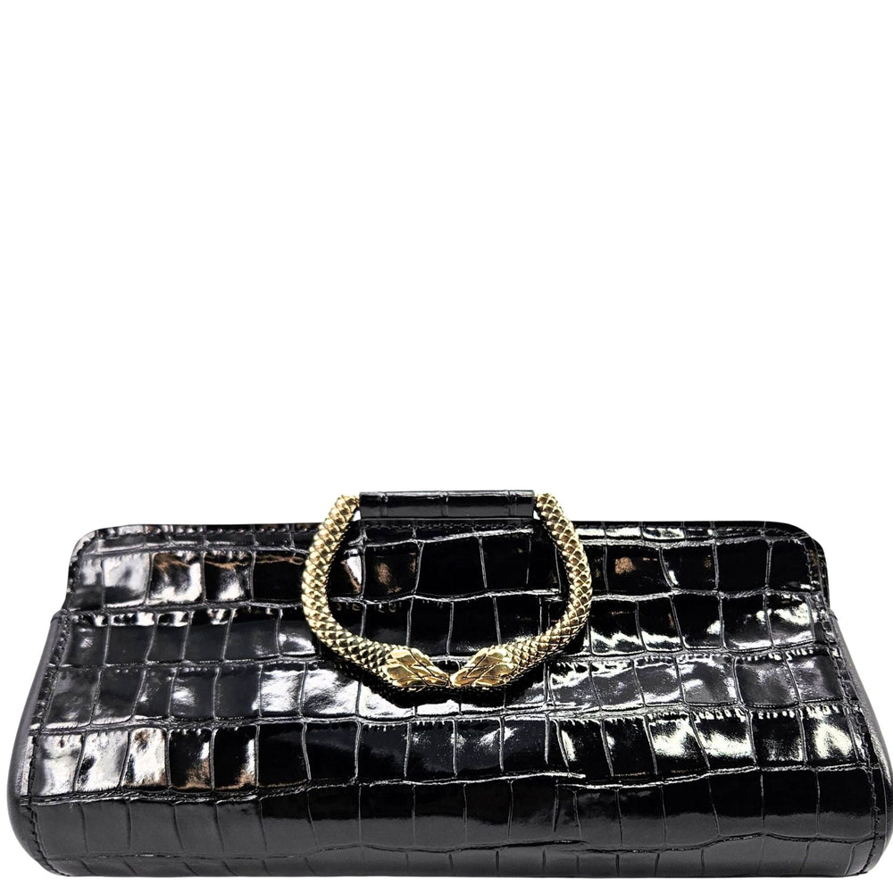 Black croc-embossed clutch top handle with gold-tone clasp detail
