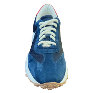 Navy jogger sneaker with cream laces, blue suede upper, tan tread outsole, rear view