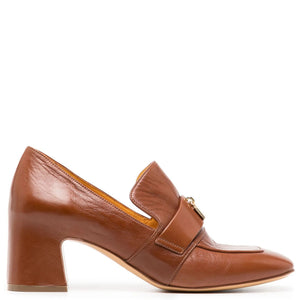 Tan leather loafer with block heel, slip-on strap and gold buckle detail