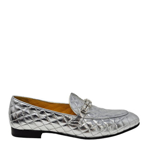 Quilted metallic silver flat loafer with decorative tassel bar and low block heel